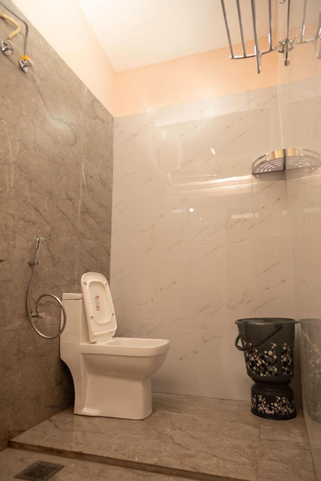 Bbn Serviced Apartment กาลังกูติ ห้อง รูปภาพ