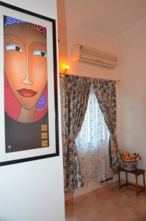 Bbn Serviced Apartment กาลังกูติ ห้อง รูปภาพ